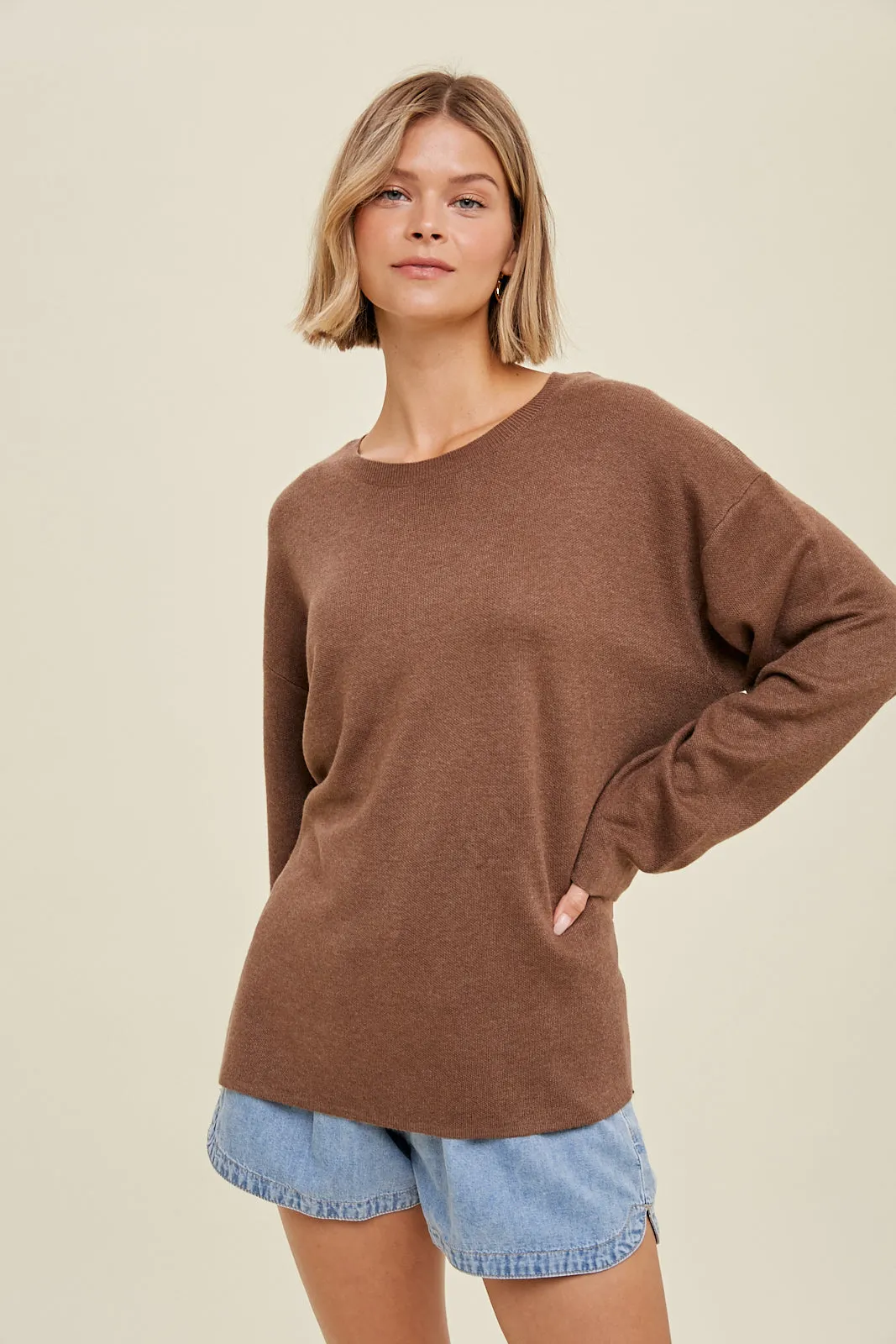 Drop shoulder sweater with side slits